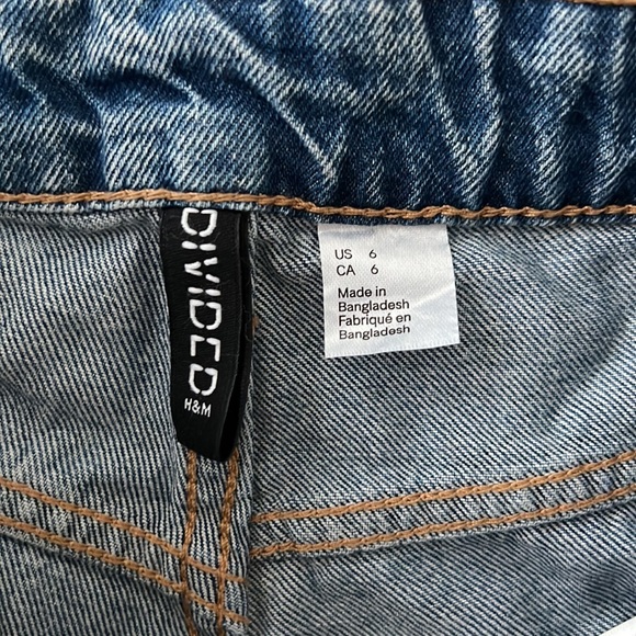 Never worn- tag fell off. Lace up style raw hem shorts with button up styling - Picture 2 of 2